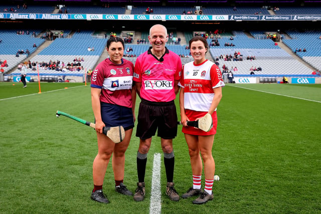 Westmeath’s Julie McLoughlin and Aine Barton of Derry with referee Cathal McAllister at the coin toss in Croke Park. (Photo: INPHO/Ryan Byrne)