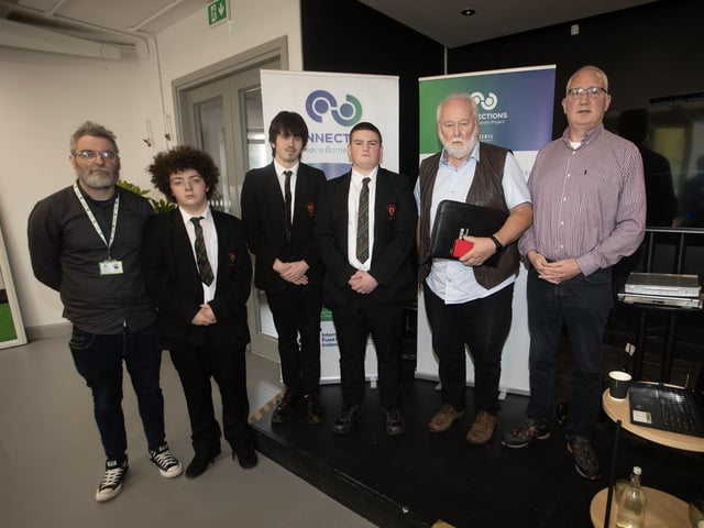 THE EXODUS. . . . .St. Joseph's Boys School students Jayden Coul, Jayden Nixon and Rory Duffy pictured at Monday's Connections Peace Barrier Project "Did Ye Hear About?" on Monday last at the Gasyard. Included on left, Chris McDonagh, co-ordinator, Pat McArt, host and Brian Dougherty, author 'The Exodus.' (Photos: Jim McCafferty Photography) : .