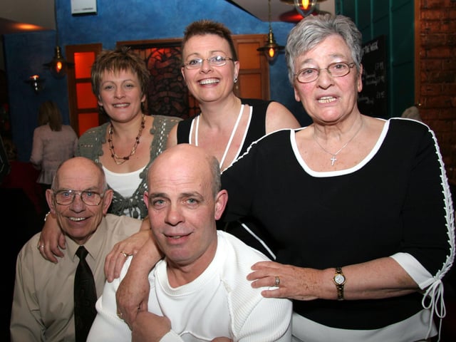 Avril poses for a photograph with husband Jim, daughters, Vivien, Yvonne and son Peter 0063JML : Parties and celebrations April 2006: Avril Mitchell.