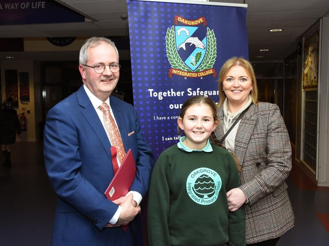 Oakgrove Integrated College Acting Principal, Mr. John Harkin Pictured with Oakgrove Primary School pupil Megan McKenna and her mum Lisa.