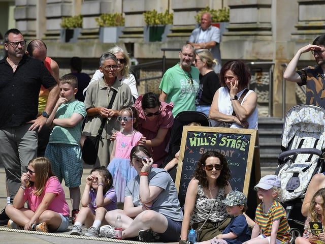 Spectators at an IYSC Youth Circus performance in Guildhall Square during the Carnival of Colours Festival. Photo: George Sweeney