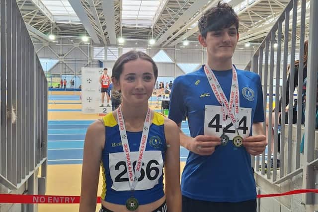 Kellie Carty and Malachy Mullan with their jumps medals on Sunday in Abbotstown.