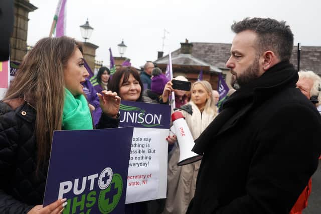 SDLP leader Colum Eastwood arriving for the talks last week speaking with union members. Picture by Jonathan Porter/PressEye