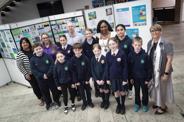 Pupils from Holy Child PS and St. Patrick's PS, Pennyburn pictured with the Mayor, Lillian Seenoi-Barr at Wednesday's DEEDS event in the Millennium Forum. Included are Lisa Heaney, Millennium Forum, Sabrina Lynch, OLT, George McGowan, OLT and Sinead Devine, DEEDS Co-Ordinator, Old Library Trust.