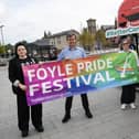 TRANSLINK ACCESSIBILITY BUS FOR PRIDE PARADE. . . .Pictured at Waterside Railway Station, Derry this week to promote the availability of an Translink Accessibility bus for Saturday's Annual Foyle Pride Parade are, front from left, Mel Bradley, Foyle Pride, Tony McDaid, Assistant Manager, Translink and Anita Villa, Foyle Pride. At back are Translink drivers Malcolm Crawford and Ronan Ward.