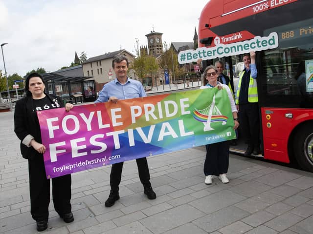 TRANSLINK ACCESSIBILITY BUS FOR PRIDE PARADE. . . .Pictured at Waterside Railway Station, Derry this week to promote the availability of an Translink Accessibility bus for Saturday's Annual Foyle Pride Parade are, front from left, Mel Bradley, Foyle Pride, Tony McDaid, Assistant Manager, Translink and Anita Villa, Foyle Pride. At back are Translink drivers Malcolm Crawford and Ronan Ward.