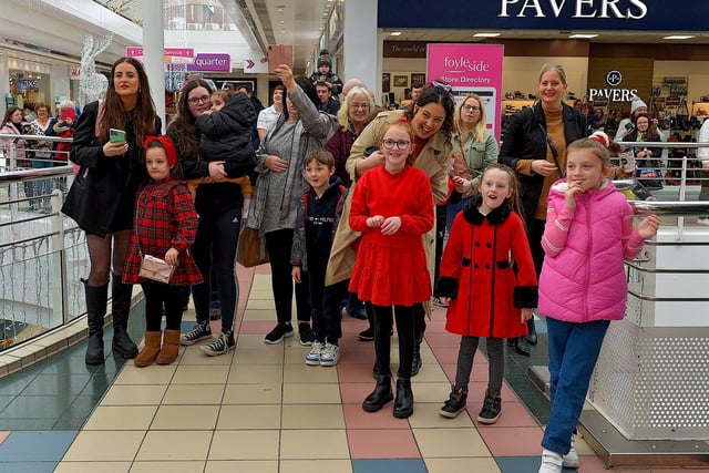 Children and parents gather at Foyleside Shopping Centre on Saturday morning to greet Santa. Photo: George Sweeney.  DER2244GS – 72
