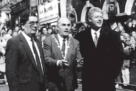 The late John Hume with Bill Clinton and Mayor, John Kerr in Shipquay Street in 1995.