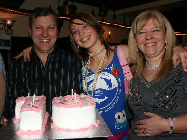 Mum and dad pictured with the Birthday Girl 2221/dd : Parties and celebrations January 2006: Erin Connolly.