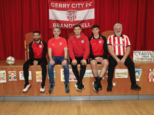 Derry City FC players players Michael Duffy, Brian Maher and Conal McDermott with school principal, Ian Gallagher and teacher Stephen McCallion at the pre-Cup final visit St. Patrick’s PS, Pennyburn,  (Photo - Tom Heaney, nwpresspics)