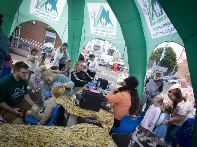 Enjoying the Henna hand painting at the Feile '25s Party in the Park (Big Bog BBQ) in Pilot's Row on Saturday. (Photos: Jim McCafferty Photography) : .