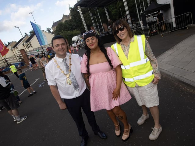 The Mayor, Ruairi McHugh pictured with one of the singers (and her security) during Friday's Feile Funday at the Gasyard. (Photos: Jim McCafferty Photography) : .