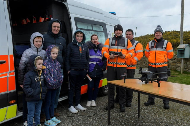 Visitors pictured with members of the Irish Coast Guard at the Emergency Services Showcase held at Fort Dunree, Inishowen, on Sunday. Photo: George Sweeney