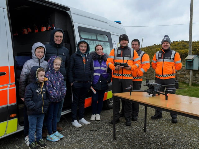 Visitors pictured with members of the Irish Coast Guard at the Emergency Services Showcase held at Fort Dunree, Inishowen, on Sunday. Photo: George Sweeney