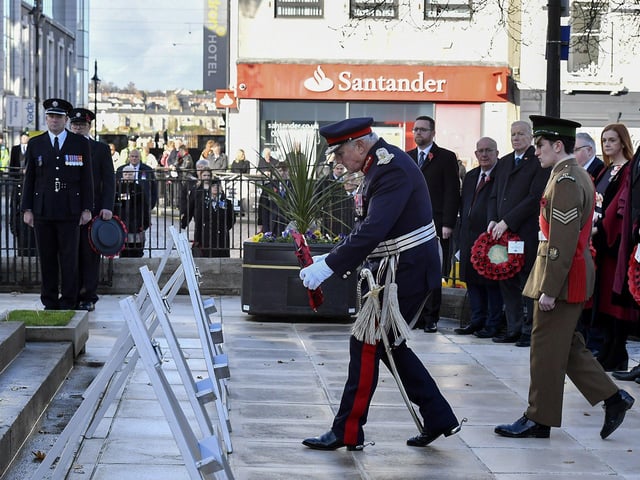 The Lord Lieutenant for the County Borough of Londonderry, Ian Crowe MBE, places a wreath at the Cenotaph in the Diamond during the Royal British Legion Waterside Remembrance Sunday service. Photo: George Sweeney