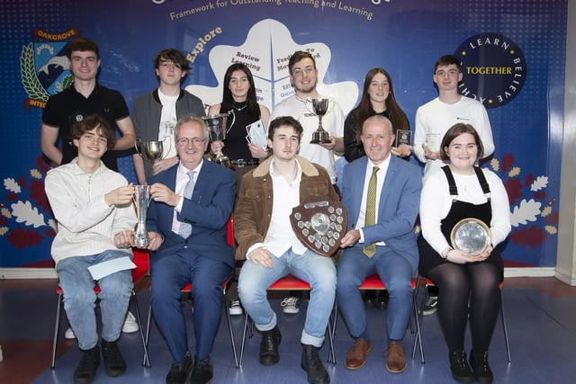 Mr. John Harkin, Acting Principal and Mr. Conal Donaghy, Retiring Vice. Principal pictured with Year 12 prizewinners. Front from left, James Tomlinson, Steven Gillespie, and Emily Lyttle. Back from left, Dara Donaghy, Saran Quigley, Grace Donaghey, Ryan Wilson, Suranne Mullan and Aaron McLaughlin. (Photos: Jim McCafferty Photography)