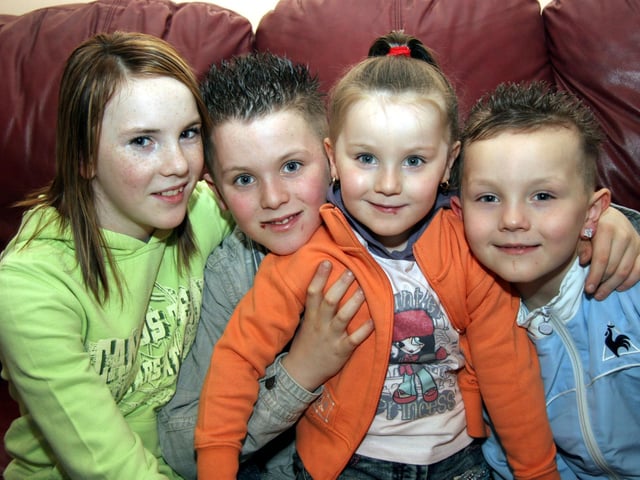 Birthday boy Michael smiles for the camera with sisters Jennifer, Jessica and brother Jordan 0048JML : Parties and nights out in Derry and Donegal in February 2006.