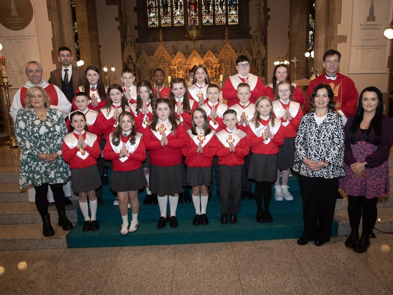 Pupils from St Eugene's Primary School who received the Sacrament of Confirmation from Fr. Shaun Doherty at St. Eugene's Cathedral on Friday evening last. Included from left are Ms. Rachel Caldwell, Classroom Assistant, Fr. Paul Farren, Mr. Michael Gilmore, P7 teacher, Mrs. Carol Duffy, Principal and Ms. Natalie Doherty, Classroom Assistant. (Photo: Jim McCafferty Photography)