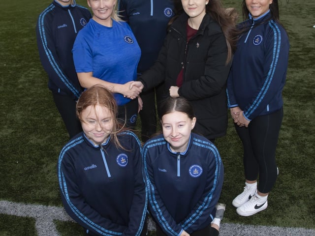Mrs. Jennie Martin, Head of PE, St. Mary’s College welcoming Lauren Curran, Ballymagroarty/Hazelbank Community Partnership, sponsors of the Primary Schools Duathlon on Wednesday at the school. Included are some of the students who helped organise the day’s event.