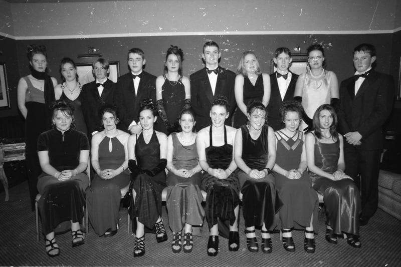 Seated, from left, Catherine Price, Leanne Dockery, Joanne Noone, Martin Canny, Breda Doherty, Louise Doherty, Tanya Doherty and Pamela Doherty. Standing, from left, Elaine Doherty, Bláithín Sweeney, Kevin McLaughlin, Pearse Doherty, Aileen Devlin, Sean-Paul Doherty, Mary McLaughlin, Roger Doherty, Evelyn Coyle and Liam McLaughlin. Pictured at the Carndonagh Community School formal in January 1998.