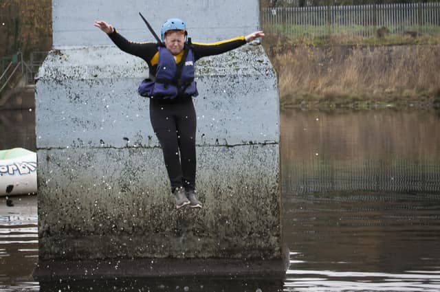 One of the brave St. Joseph’s Boys School staff members makes the plunge.