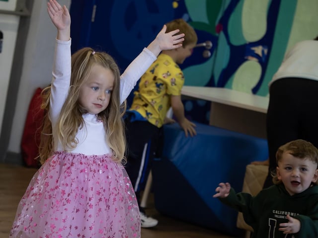 One of the young dancers gets a round of applause after her routine on Sunday. : .