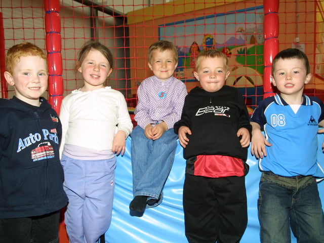 Adam Dickson, Karen Doherty, Aaron Ward, Shaun McLaughlin and Tiarnan Canning smile for the camera at the birthday party in the Fun Factory