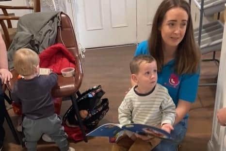 Jane, a breastfeeding support volunteer at the Western Trust, proving support to local mothers and their children.