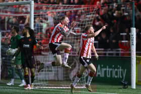 Ronan Boyce and Carl Winchester celebrate after the Ramelton man's bicycle kick in front of the North Stand against Cork City.