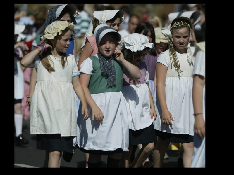 Little maids a marching in the sunshine during the Golden Link Festival parade.  (2608JB53)