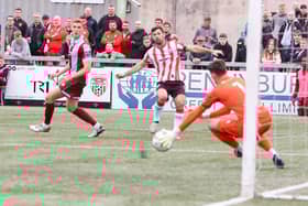 Derry City striker Pat Hoban tries his luck from distance.