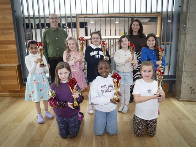 Adjudicators Gerry Guckian and Blathnaid Biddle pictured with a selection of prizewinners at Saturday's Feis.