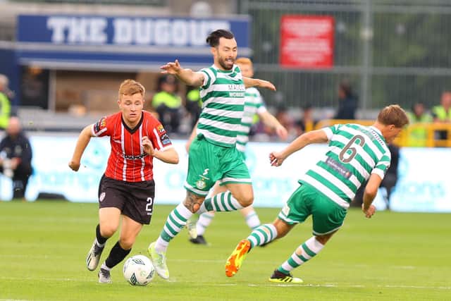 Brandon Kavanagh, who enjoyed a great game against his former team, gets away from Richie Towell. Photograph by Kevin Moore.