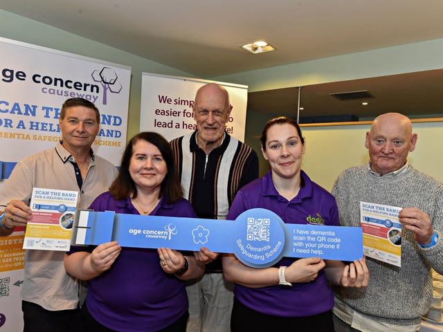 DEEDS staff and members Mick Canny, Wendy McLaughlin, Leonard Mills Kathleen McNaught and Gerard McGill at the launch of the ‘Scan the Band’ Dementia Safeguarding Scheme in the Guildhall. Photo: George Sweeney
