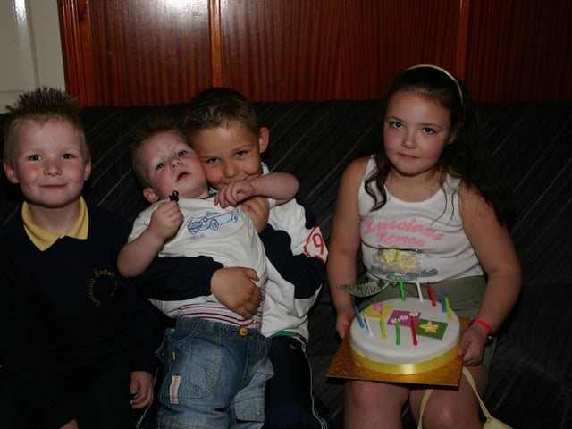 Nicole Clarke with her brothers at the Disco Party Coilin, Tiarnan and Micheal. 4856dd : Parties and celebrations in April 2005.