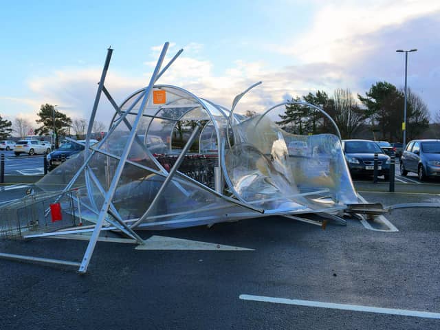 Trolley bays at Sainsburys damaged by Storm Isha. Photo: George Sweeney