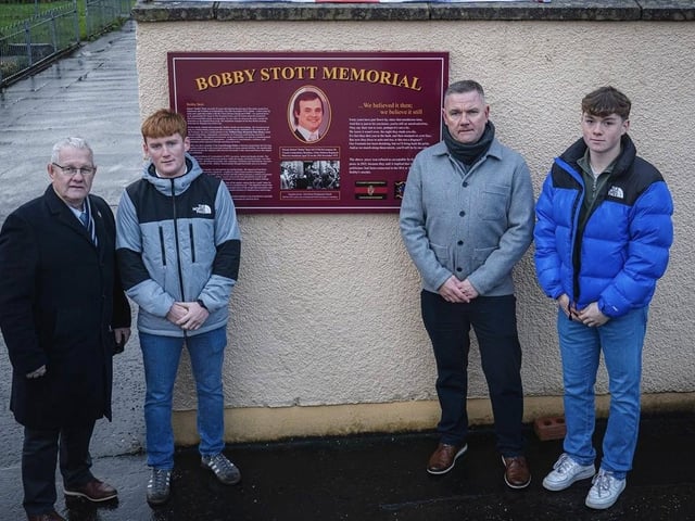The family, friends and former band mates of Bobby Stott at the unveiling of a plaque in his memory on Sunday.