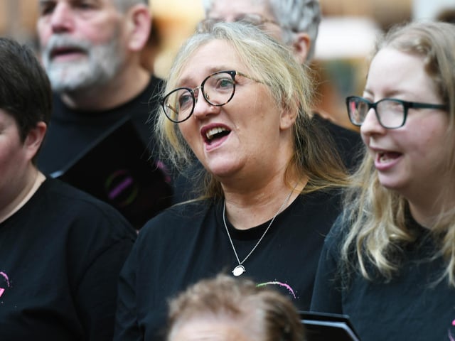 Members of the Just Us Choir from Enniskillen enjoy performing the the Foyleside Shopping Centre on Saturday.