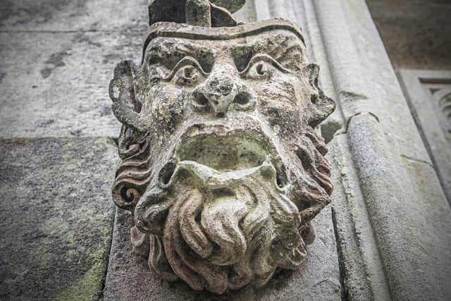An engraved head at Learmount House.