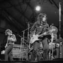 Rory Gallagher playing his 1961 Stratocaster with bassist Gerry McAvoy and drummer Wilgar Campbell at the Reading Festival in 1971. (Photo by Michael Putland/Getty Images)