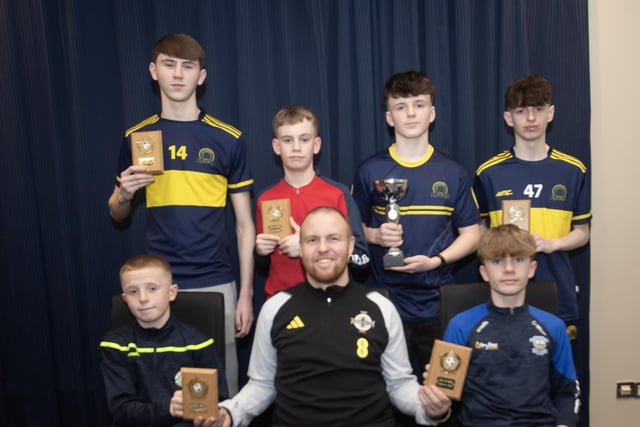 PLAYERS OF THE YEAR. . . . .Ronan O'Donnell, Irish Football Association, special guest, presenting Player of the Year awards at the D&D Youth Awards at the City Hotel on Friday night last. Front from left, Josh O'Donnell, Sion Swifts (u-12) and Ollie McDaid, Strabane Athletic (u-12). Back from left, Darragh McCay, Don Boscos (u-16), Sam Turner, Clooney YC (u-13), Ciaran Mullan, Don Boscos FC (u-17) and Jack Fleming, Don Boscos FC (u-15). Photos: Jim McCafferty Photography)