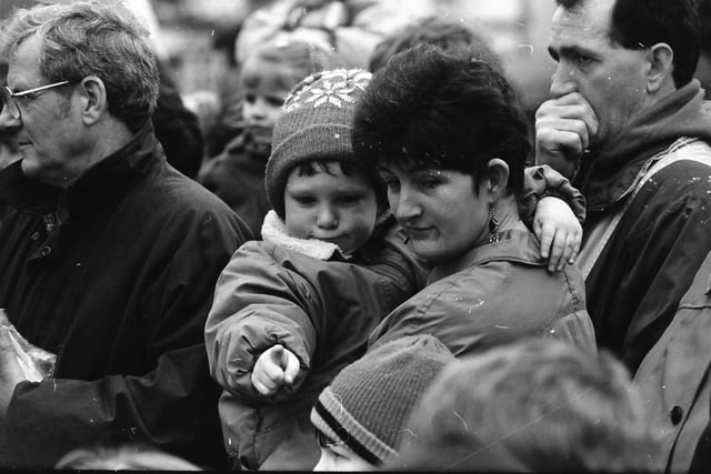 Pointing out the performers at the St. Patrick's Day parade in Moville on March 17, 1993.