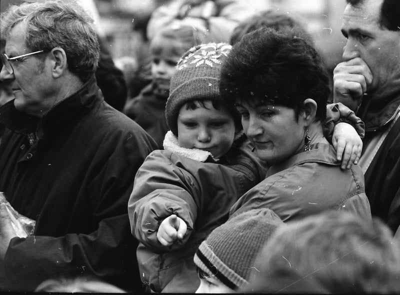 Pointing out the performers at the St. Patrick's Day parade in Moville on March 17, 1993.