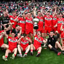 Derry players celebrate with the Christy Ring Cup. Photo by Seb Daly/Sportsfile