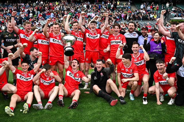 Derry players celebrate with the Christy Ring Cup. Photo by Seb Daly/Sportsfile