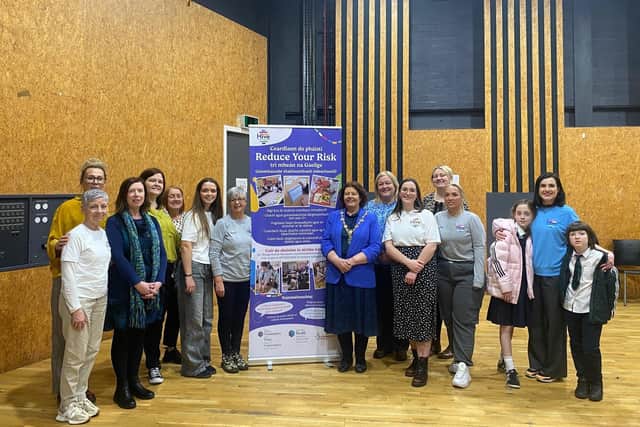 Mayor of Derry City and Strabane Patricia Logue pictured with staff of Hive Cancer Support and guests at the launch of the children’s ‘Reduce Your Risk’ cancer preventiontoolkit, which is now available in the Irish language.