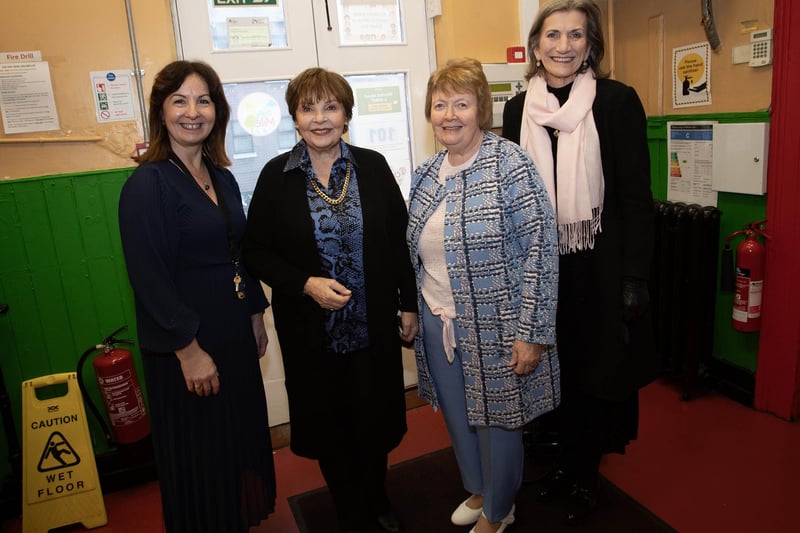 Mrs Carol Duffy, Principal (left), St. Eugene's Primary School, welcoming former pupil  Dana, Moira Carlin (former school secretary), and Marie Lindsay (Board of Governors) to Monday's opening of the new playgrounds at the school. (Photos: Jim McCafferty Photography)