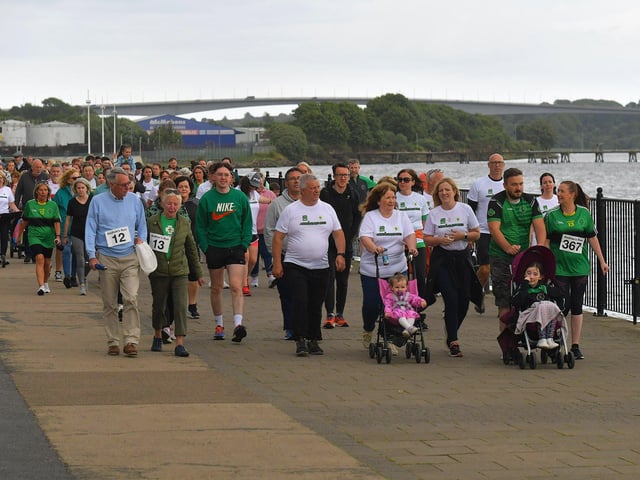 The 2023 Aodhan’s 5k race, run, walk moves along Foyle Embankment towards the Peace Bridge and St Columb’s Park on Thursday evening last. Photo: George Sweeney. DER2326GS – 60