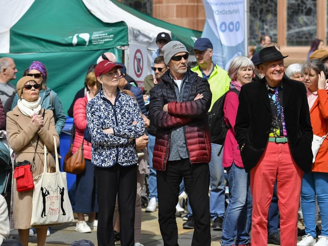 People gather in Guildhall Square for the live music during the City of Derry Jazz Festival. Photo: George Sweeney