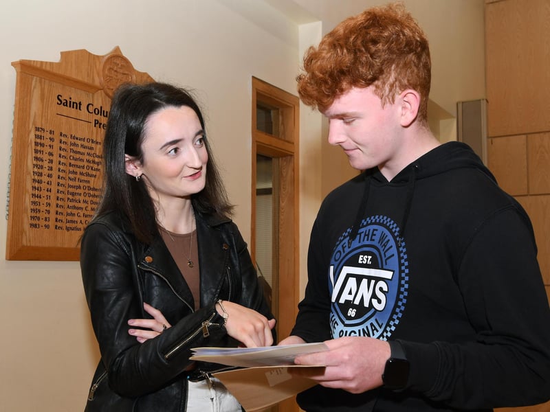Teacher Leanne Curran chats to student Jason Sheerin, when he collected his GCSE results at St. Columb's College on Thursday morning. (Photos: Keith Moore)